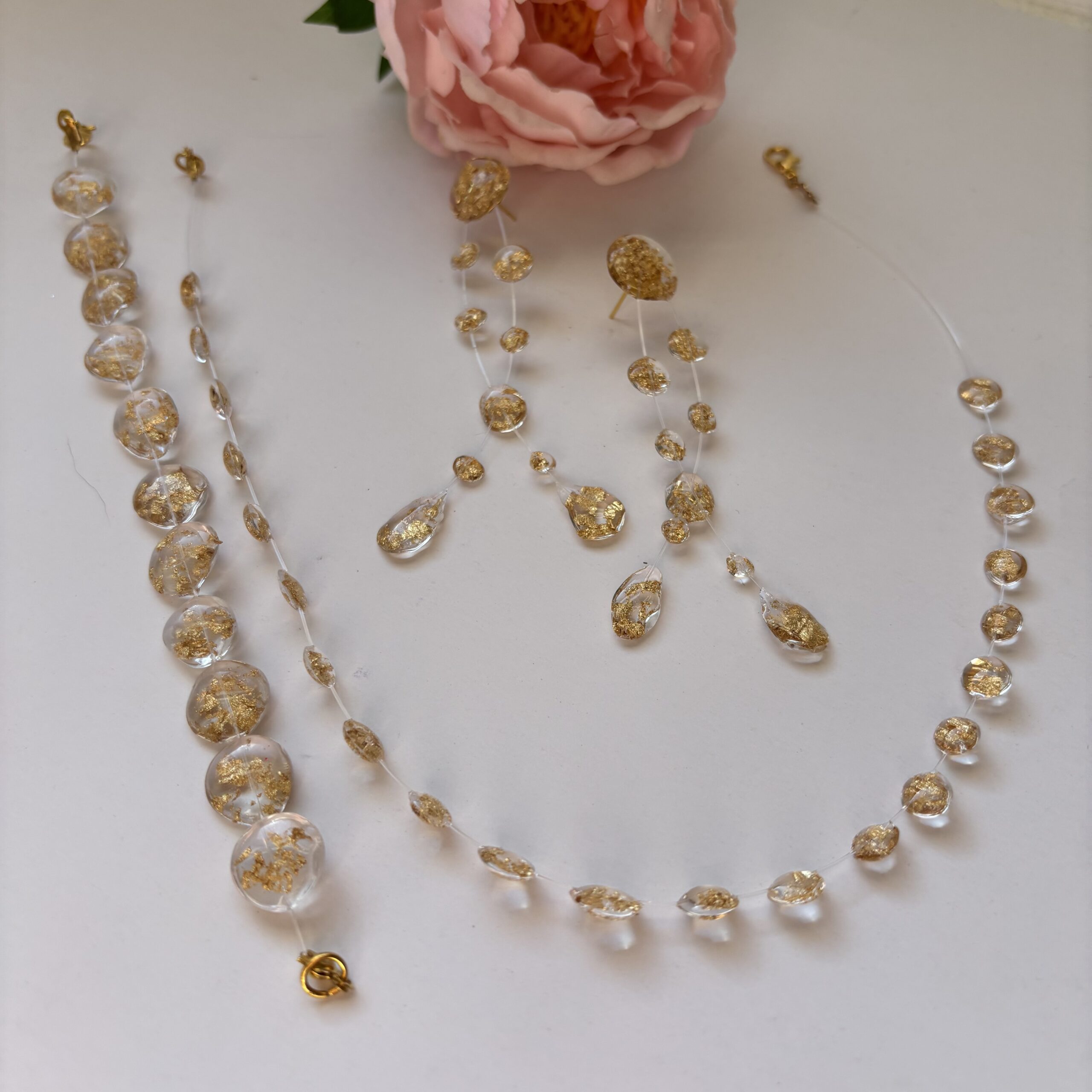Conjunto gotas de oro.